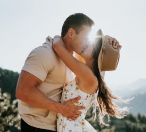 Man holding woman